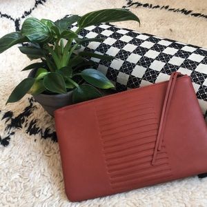 FEED Clutch/ Pouch in Brick Red + Embossed Detail